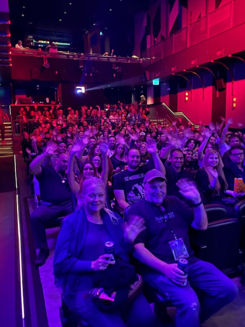 Festival audience waving from the seats